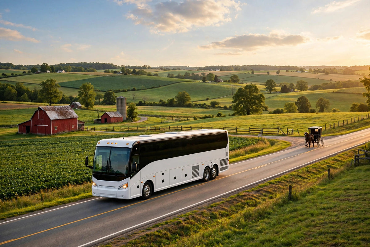White tour bus driving through Lancaster County PA farmland - multi-day bus trips with Joy Travel Bus Excursions